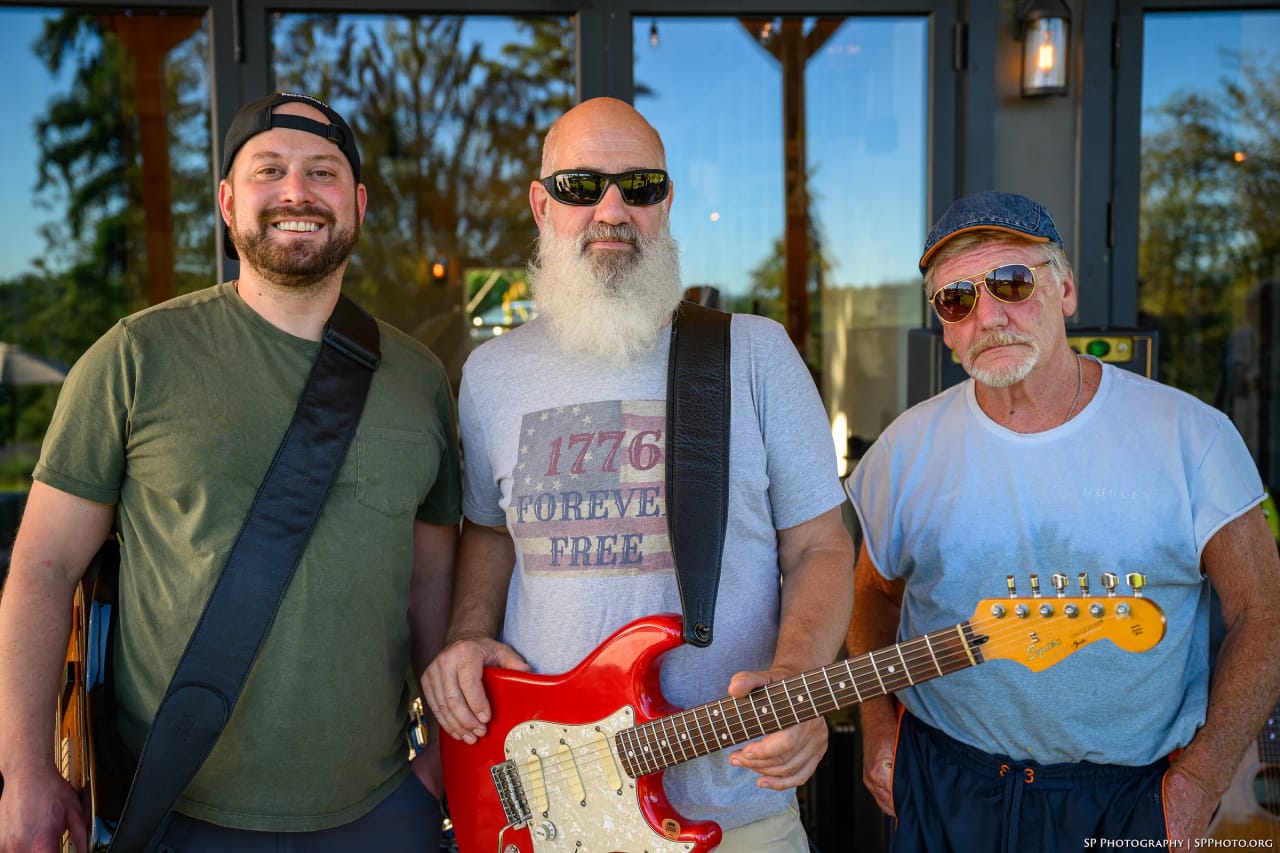 Phatt Ruby together outside at golden hour — Grant Stampfli, Carey Calhoun and Mike Lynch